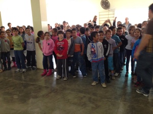 Elementary school children lining up to sing "Here Comes the Sun" for us